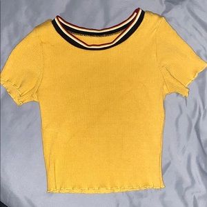 Large gold crop top.